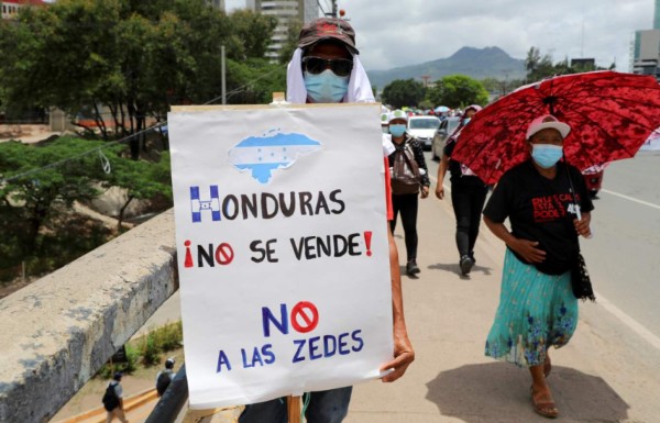 Hondureños marchan para rechazar zonas de empleo