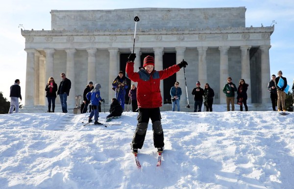 WASHINGTON, DC - JANUARY 25: Sanders Durix skis on the steps of a closed Lincoln Memorial January 25, 2016 in Washington, DC. Winter Storm Jonas hit the East Coast over the weekend, breaking snowfall records, closing places of work, causing 29 storm-related deaths, leaving thousands of homes without power and serious flooding in coastal areas. Win McNamee/Getty Images/AFP== FOR NEWSPAPERS, INTERNET, TELCOS & TELEVISION USE ONLY ==