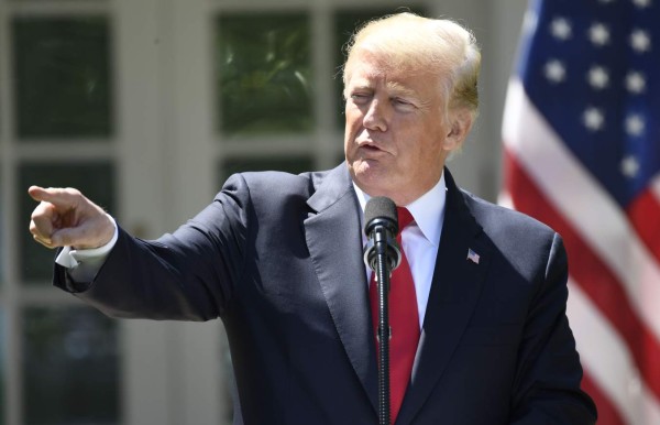 Trump evita hablar de su insulto a África en reunión con el líder de Nigeria