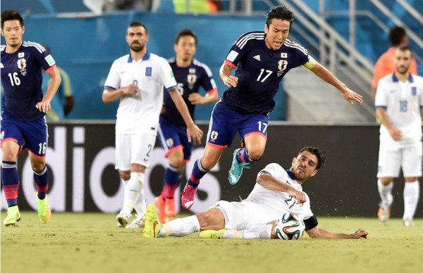 Japón y Grecia firman un empate que no beneficia a ninguno