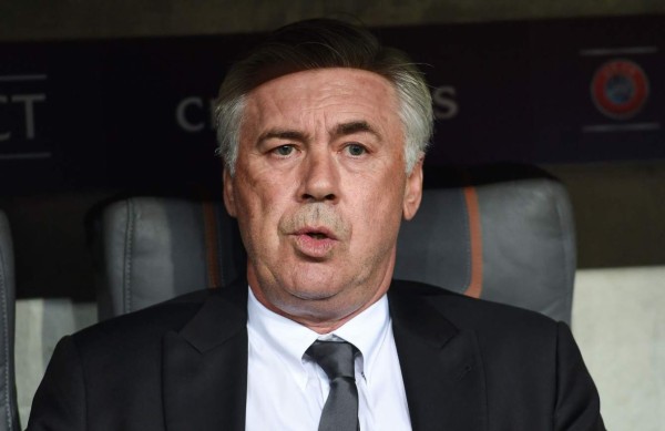 Bayern Munich's German midfielder Serge Gnabry wears an armlet reading 'Black Lives Matter' in solidarity with protests raging across the US over the death of George Floyd as he warms up before the German first division Bundesliga football match Bayer 04 Leverkusen v FC Bayern Munich on June 6, 2020 in Leverkusen, western Germany. - The death during the arrest of George Floyd, an unarmed black man in the US state of Minnesota, has brought tens of thousands out onto the streets during a pandemic that is ebbing in Asia and Europe, but spreading in other parts of the world. (Photo by Matthias Hangst / POOL / AFP) / DFL REGULATIONS PROHIBIT ANY USE OF PHOTOGRAPHS AS IMAGE SEQUENCES AND/OR QUASI-VIDEO