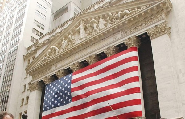 Una ola de fusiones le da nuevos bríos a las bolsas de Estados Unidos