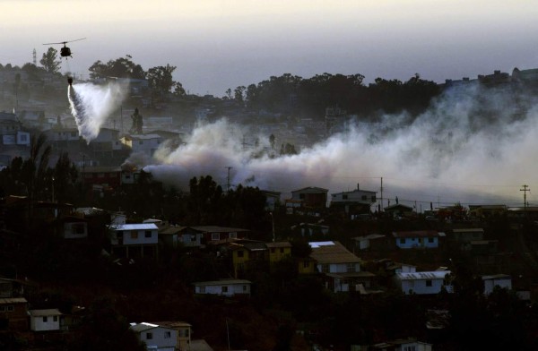 Aumenta a 15 número de muertos en incendio en Chile