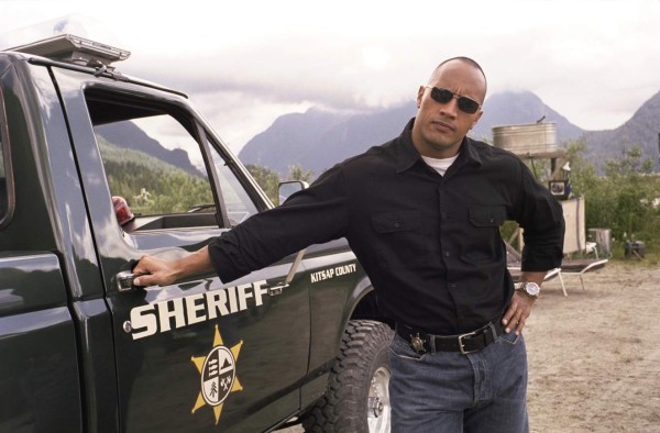 UNDATED -- BC-HOLLYWOOD-WATCH-DWAYNE-JOHNSON-ART-NYTSF -- “Walking Tall,” in which he played a sheriff battling against overwhelming odds, demonstrated that former wrestler Dwayne “The Rock” Johnson had what it took to be a movie star. (CREDIT: Photo by Bob Akester. Copyright 2004 Metro-Goldwyn-Mayer.)--ONLY FOR USE WITH ARTICLE SLUGGED -- BC-HOLLYWOOD-WATCH-DWAYNE-JOHNSON-ART-NYTSF -- OTHER USE PROHIBITED.