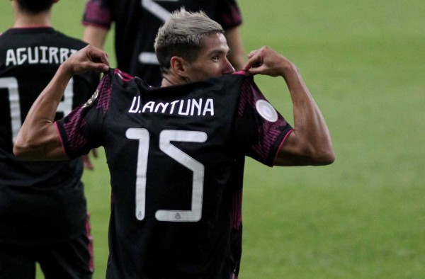 Mexico's Uriel Antuna celebrates after scoring a goal against the United States during their CONCACAF Olympic Qualifying soccer match at the Jalisco Stadium in Guadalajara, Mexico, March 24, 2021. (Photo by Ulises Ruiz / AFP)