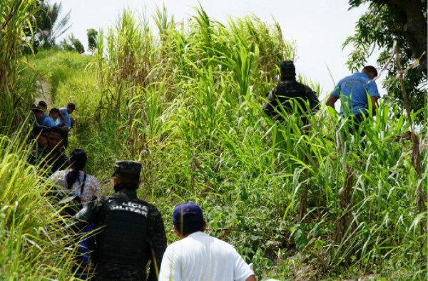 Hallan victimado a joven en matorrales de colonia de Choloma