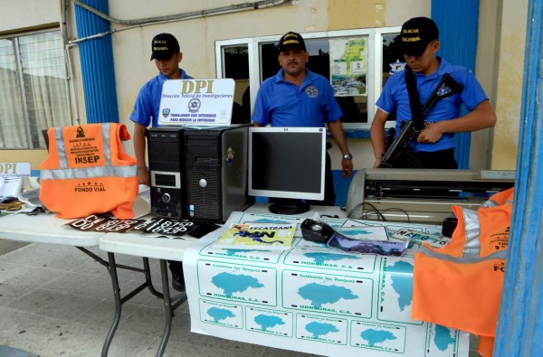 DPI desmantela centro de clonación de placas de carros
