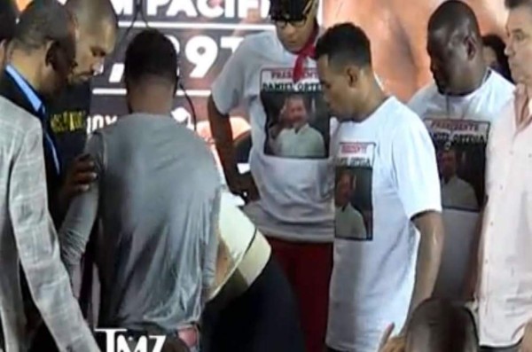 Boxeador nalguea a novia de su rival y casi lo 'estrangula'