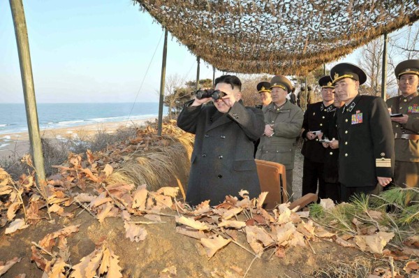(FILES) This file picture released by North Korea's official Korean Central News Agency on March 26, 2013 and taken on March 25, 2013 shows North Korean leader Kim Jong-Un (L) inspecting the landing and anti-landing drills of KPA Large Combined Units 324 and 287 and KPA Navy Combined Unit 597 at an undisclosed location on North Korea's east coast. North Korea announced on January 6, 2016 it had successfully carried out its first hydrogen bomb test, a development that, if confirmed, would marking a stunning step forward in its nuclear development. THIS PICTURE WAS MADE AVAILABLE BY A THIRD PARTY. AFP CAN NOT INDEPENDENTLY VERIFY THE AUTHENTICITY, LOCATION, DATE, AND CONTENT OF THIS IMAGE. THIS PHOTO IS DISTRIBUTED EXACTLY AS RECEIVED BY AFP. AFP PHOTO / FILES / KCNA via KNS REPUBLIC OF KOREA OUT ---EDITORS NOTE--- RESTRICTED TO EDITORIAL USE MANDATORY CREDIT 'AFP PHOTO / FILES / KCNA via KNS' - NO MARKETING NO ADVERTISING CAMPAIGNS - DISTRIBUTED AS A SERVICE TO CLIENTS