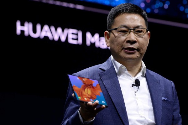 Richard Yu, the CEO of Huawei's consumer products division presents the new HUAWEI Mate X foldable smartphone at the Mobile World Congress (MWC), on the eve of the world's biggest mobile fair, on February 24, 2019 in Barcelona. - Phone makers will focus on foldable screens and the introduction of blazing fast 5G wireless networks at the world's biggest mobile fair starting tomorrow in Spain as they try to reverse a decline in sales of smartphones. (Photo by Josep LAGO / AFP)