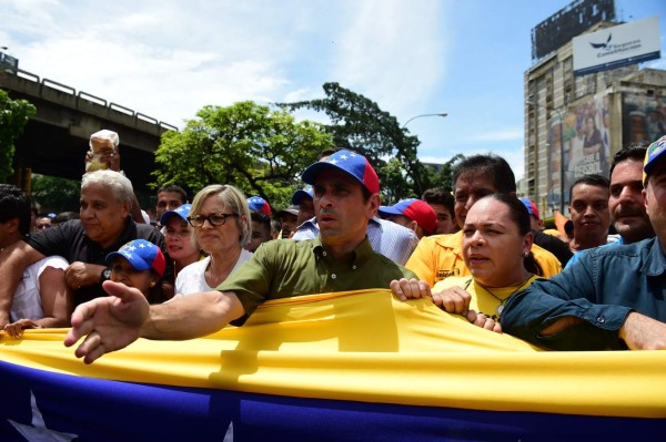 La oposición insiste en el revocatorio ante el Consejo Nacional Electoral. AFP