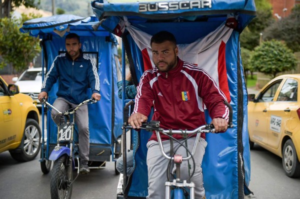 Venezolanos en Colombia cambian de oficio para sobrevivir