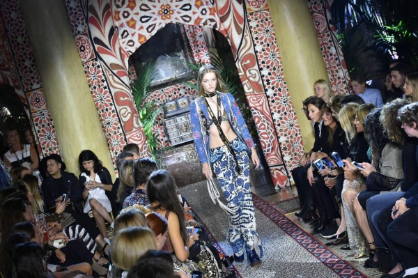 A model presents a creation for fashion house Roberto Cavalli during the 2017 Women's Spring / Summer collections shows at Milan Fashion Week on September 21, 2016 in Milan.