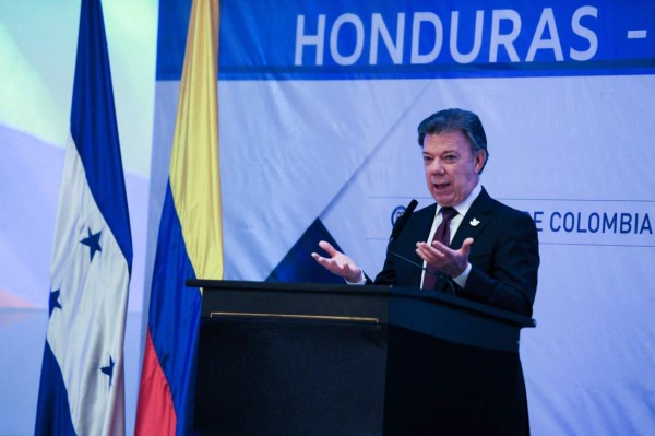 El Presidente de Colombia, Juan Manuel Santos, en el foro empresarial en Tegucigalpa.