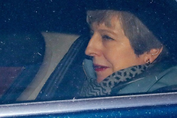 Britain's Prime Minister Theresa May leaves from the Houses of Parliament in Westminster, in central London on March 27, 2019, after hearing the outcome of the indicative votes on the alternative options for Brexit. - Prime Minister Theresa May on Wednesday pledged to step down if MPs back her EU divorce deal, in a bid to break the Brexit deadlock in Britain's fractured parliament. Her dramatic gambit came just two hours before MPs started a flurry of votes seeking a last-minute alternative Brexit plan to replace her deal. (Photo by Tolga AKMEN / AFP)