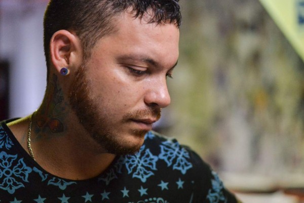 Juan Jose Herrera, 35, the son of Ismael Enrique Arciniegas, who was arrested in China for drug trafficking, reacts on February 27, 2017, in Cali, Valle del Cauca department, Colombia. Arciniegas was arrested in China in mid-2010 and sentenced to death after confessing that he had smuggled nearly four kilos of cocaine into the country. On Monday, the Colombian government 'profoundly lamented' the sentence, to be carried out 'within the new few hours,' 'despite repeated requests for mercy' and for the death penalty to be commuted. / AFP PHOTO / LUIS ROBAYO / TO GO WITH AFP STORY