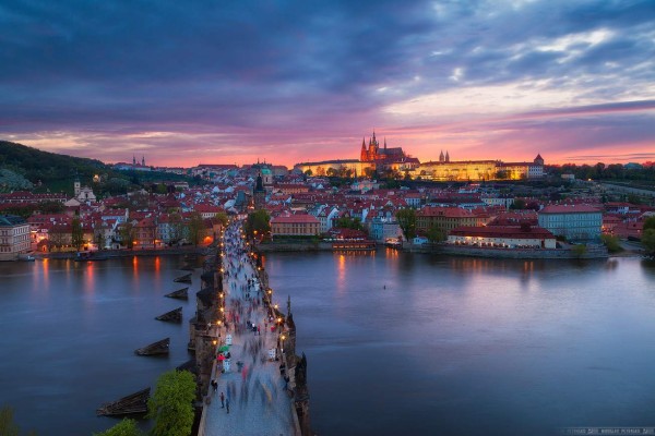 TOPSHOTSTourists play in zorb balls on the Vltava river as temperatures reached 34 degrees Celsius on July 18, 2015 in Prague, Czech Republic.AFP PHOTO/MICHAL CIZEK