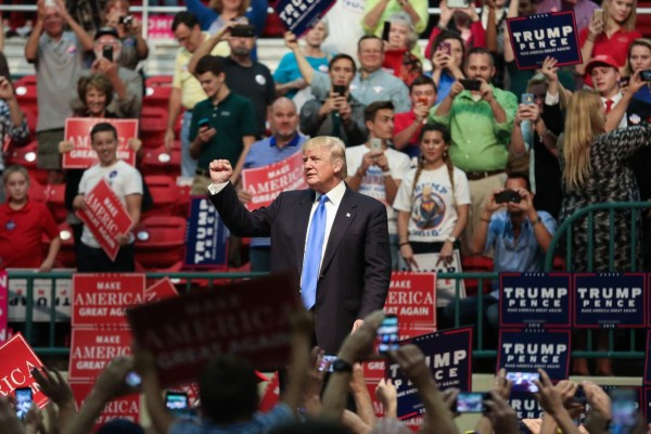 Republican presidential nominee Donald Trump speaks during a campagin rally inside the Cabarrus Arena 7 Events Center in Concord, North Carolina. / AFP PHOTO / Logan Cyrus