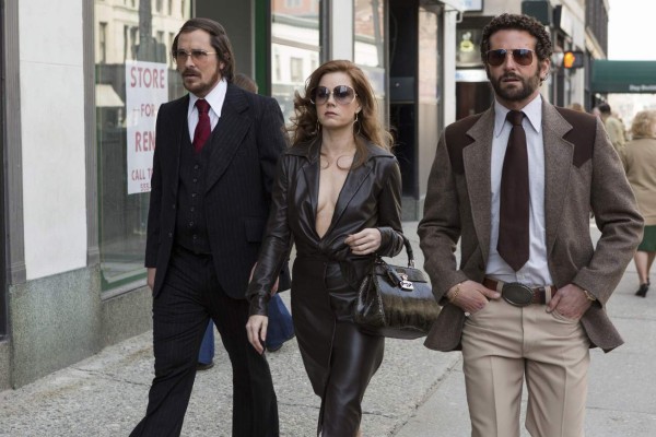 UNDATED -- BC-HOLLYWOOD-WATCH-AMY-ADAMS-NYTSF -- Amy Adams, Christian Bale (left) and Bradley Cooper played con artists in David O. Russell’s farce “American Hustle.” All three were Oscar-nominated, as was Russell and the film. (CREDIT: Photo by Francois Duhamel. Copyright 2013 Columbia Pictures.)--ONLY FOR USE WITH ARTICLE SLUGGED -- BC-HOLLYWOOD-WATCH-AMY-ADAMS-ART-NYTSF -- OTHER USE PROHIBITED.