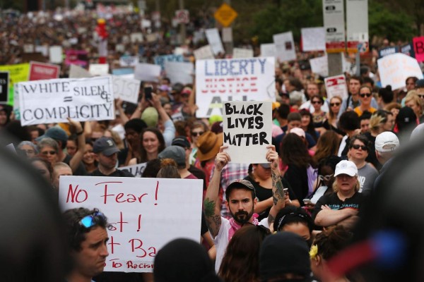BOSTON, MA - AUGUST 19: Thousands of protesters prepare to march in Boston against a planned 'Free Speech Rally' just one week after the violent 'Unite the Right' rally in Virginia left one woman dead and dozens more injured on August 19, 2017 in Boston, United States. Although the rally organizers stress that they are not associated with any alt-right or white supremacist groups, the city of Boston and Police Commissioner William Evans are preparing for possible confrontations at the afternoon rally. Spencer Platt/Getty Images/AFP