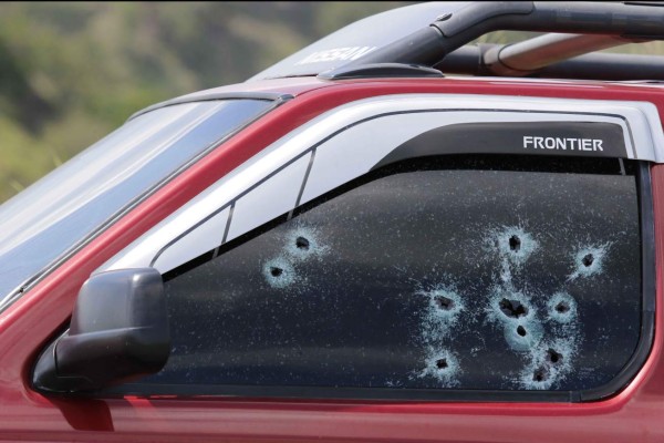 Dentro de su carro acribillan a comerciante en Santa Bárbara