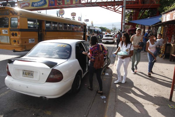 Tegucigalpa y San Pedro Sula: 6,000 taxis y buses 'brujos'