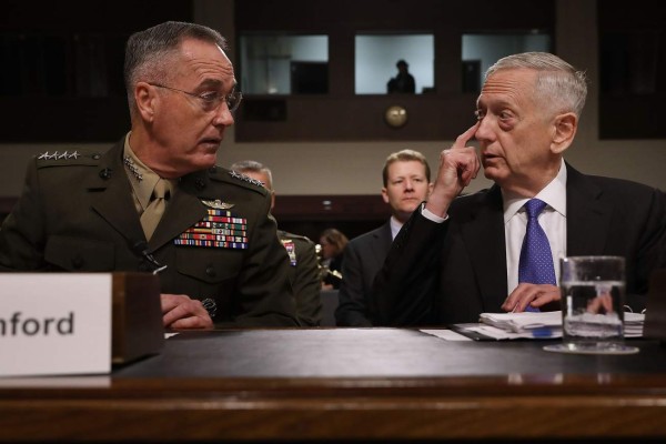 WASHINGTON, DC - JUNE 13: Chairman of the Joint Chiefs of Staff USMC Gen. Joseph Dunford (L) and U.S. Defense Secretary James Mattis prepare to testify before the Senate Armed Services Committee during a hearing in the Dirksen Senate Office Building on Capitol Hill June 13, 2017 in Washington, DC. The Pentagon leaders testified about the proposed FY2018 National Defense Authorization Budget Request. Chip Somodevilla/Getty Images/AFP== FOR NEWSPAPERS, INTERNET, TELCOS & TELEVISION USE ONLY ==