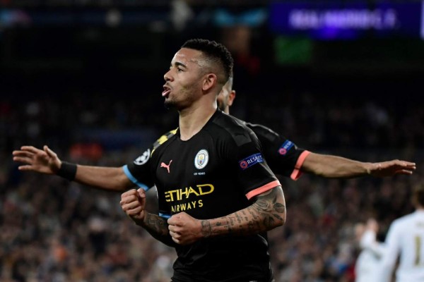 Manchester City's Brazilian striker Gabriel Jesus celebrates his goal during the UEFA Champions League round of 16 first-leg football match between Real Madrid CF and Manchester City at the Santiago Bernabeu stadium in Madrid on February 26, 2020. (Photo by JAVIER SORIANO / AFP)