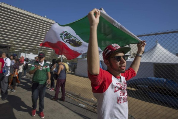 LOS ANGELES, CA - NOVEMBER 14: Students from numerous area high schools walk out of class to protest march and near City Hall against the upset election of Republican Donald Trump over Democrat Hillary Clinton in the race for President of the United States on November 14, 2016 in Los Angeles, California, United States. The mostly Latino youth walked out of class to protest because they are afraid that their families could be split up through mass deportations of millions of immigrants, as promised by Trump during his campaign. David McNew/Getty Images/AFP== FOR NEWSPAPERS, INTERNET, TELCOS & TELEVISION USE ONLY ==