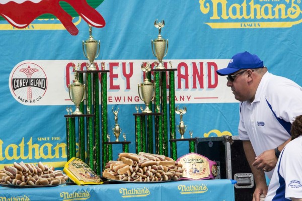 NEW YORK, NY - JULY 04: Piles of hot dogs are seen before the start of the 2017 Nathan's Famous International Hot Dog Eating Contest at Coney Island on July 4, 2017 in the Brooklyn borough of New York City. Miki Sudo won her fourth straight title in the women's division by eating 41 hot dogs in 10 minutes, and Joey Chestnut was declared the winner for this 10th title overall after eating 72 hot dogs in 10 minutes. The contest in Coney Island is in it's 101th year. Alex Wroblewski/Getty Images/AFP
