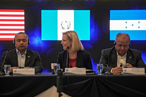 United States Secretary of Homeland Security (DHS) Kirstjen Nielsen (C) Honduran Security Minister Julian Pacheco Tinoco (R) and El Salvador's Security Minister Mauricio Ramirez Landaverde, attend the opening of the fourth meeting of security ministers of the 'Northern Triangle' in San Salvador, on February 20, 2019. - Nielsen called on Guatemala, El Salvador and Honduras security ministers to stop new caravans of migrants who illegally try to reach the US. (Photo by MARVIN RECINOS / AFP)