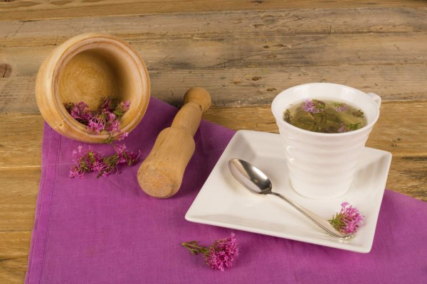 Still life with a freshly prepared valerian tea