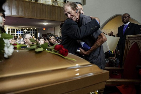 EL PASO, TX - AUGUST 16: Antonio Basco greets well wishers to a public memorial for his wife, Margie Reckard, on August 16, 2019 in El Paso, Texas. Reckard was one of 22 killed during the Walmart shooting in El Paso on August 3rd. Basco invited the public to attend the memorial in her honor and has laid fresh flowers everyday since the shooting at a make-shift memorial outside the outlet. Sandy Huffaker/Getty Images/AFP== FOR NEWSPAPERS, INTERNET, TELCOS & TELEVISION USE ONLY ==