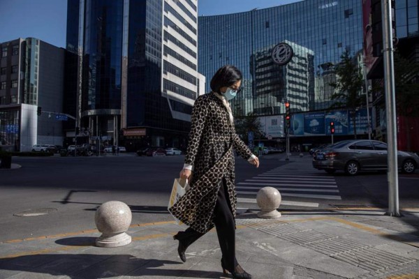 Desciende a una decena la cifra de nuevos contagios en China  