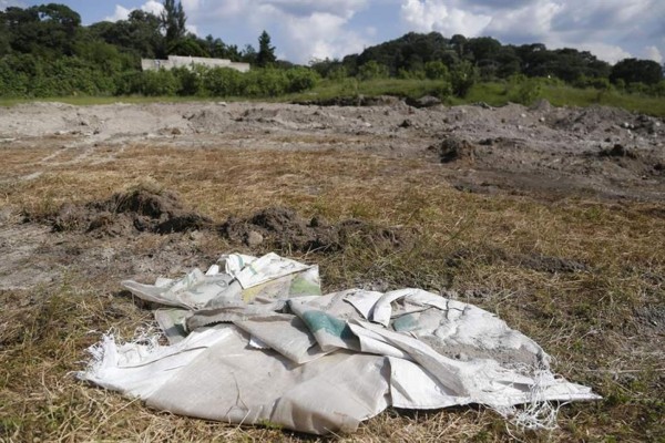 Hallazgo de fosa con 44 cadáveres agudiza crisis forense en oeste de México