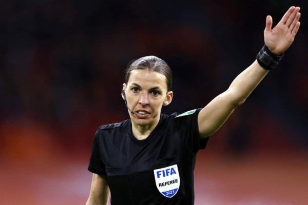 French football referee Stephanie Frappart looks on during the World Cup qualifying Group G match between the Netherlands and Latvia at the Johan Cruijff Arena in Amsterdam on March 27, 2021. - Some 5000 spectators, all with a negative Covid-19 test result, attended the match as part of the so-called fieldlabs intended as experiments to show whether events during corona time can take place safely. (Photo by MAURICE VAN STEEN / ANP / AFP) / Netherlands OUT / Amsterdam,The Netherlands,MAURICE VAN STEEN,S,SPO,The Netherlands,NLD,voetbal,2020/2021,ANP MAURICE VAN STEEN,519639,FIFA World Cup Qualifier,The Netherlands v Latvia,Dutch fans during the World Cup qualifying match between the Netherlands and Latvia at the Johan Cruijff Arena on March 27 in Amsterdam, The Netherlands. 5000 spectators, ,all with a negative Covid-19 test result, are welcome at the match. Along the field, various studies are carried out as part of the Fieldlab experiments. ANP MAURICE VAN STEEN,World Cup Qualification: The Netherlands - Latvia,775631918,FOI netherlands out - belgium out