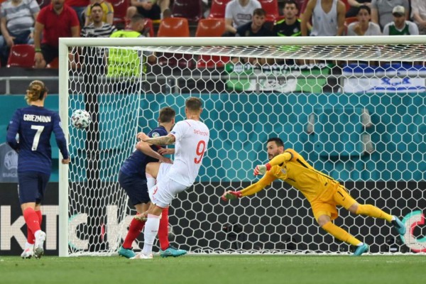 Switzerland's forward Haris Seferovic scores the opening goal during the UEFA EURO 2020 round of 16 football match between France and Switzerland at the National Arena in Bucharest on June 28, 2021. (Photo by Justin Setterfield / POOL / AFP)