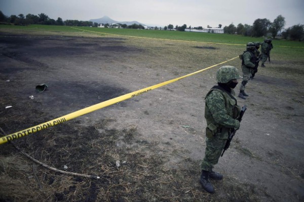 Aumenta a 114 el número de fallecidos por explosión de ducto en México
