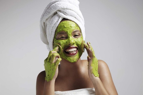woman have fun with a face mask