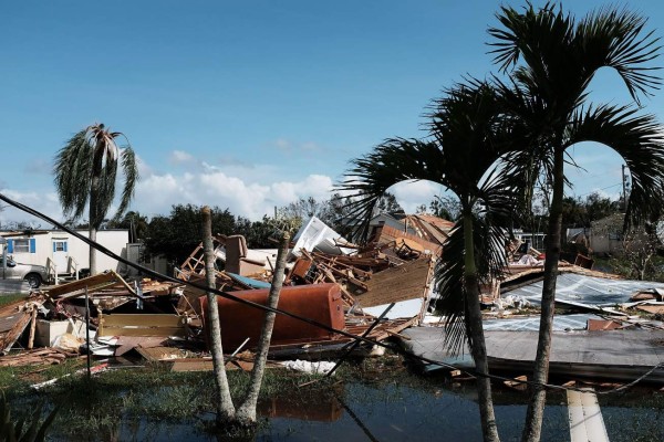 NAPLES, FL - SEPTEMBER 11: Fooded homes stand in a rural part of Naples the day after Hurricane Irma swept through the area on September 11, 2017 in Naples, Florida. Hurricane Irma made another landfall near Naples yesterday after inundating the Florida Keys. Electricity was out in much of the region with extensive flooding. Spencer Platt/Getty Images/AFP== FOR NEWSPAPERS, INTERNET, TELCOS & TELEVISION USE ONLY ==