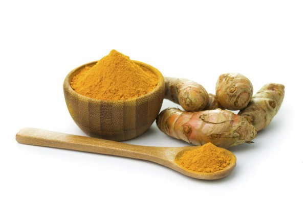 Turmeric and turmeric powder on white background