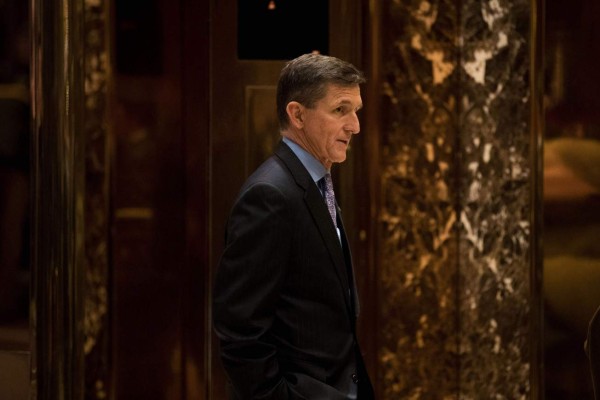 (FILES): This file photo taken on December 11, 2016 shows retired Lt. Gen. Michael Flynn, then US President-elect Donald Trump's choice for National Security Advisor, waiting for an elevator in the lobby at Trump Tower in New York City. The White House announced February 13, 2017 that Michael Flynn has resigned as President Donald Trump's national security advisor, amid escalating controversy over his contacts with Moscow. In his formal resignation letter, Flynn acknowledged that in the period leading up to Trump's inauguration: 'I inadvertently briefed the vice president-elect and others with incomplete information regarding my phone calls with the Russian ambassador.'Trump has named retired lieutenant general Joseph Kellogg, who was serving as a director on the Joint Chiefs of Staff, as acting national security advisor, the White House said. / AFP PHOTO / GETTY IMAGES NORTH AMERICA / Drew Angerer
