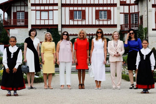 (From L) Japan's Prime Minister's wife Akie Abe, European Council President's wife Malgorzata Tusk, Australia's Prime Minister's wife Jenny Morrison, wife of French President Brigitte Macron, Chile's First Lady Cecilia Morel, President of the World Bank Group's wife Adele Malpass and US First Lady Melania Trump arrive at the Villa Arnaga in Cambo-les-Bains during a visit on traditional Basque culture, near Biarritz as part of the G7 summit, on August 25, 2019. (Photo by Thomas SAMSON / AFP)