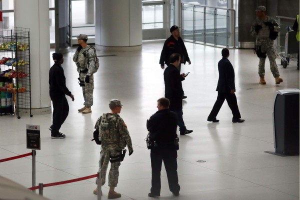 NEW YORK, NY - MARCH 24: U.S. Soldiers stand guard near a security line at John F. Kennedy Airport (JFK) on March 24, 2016 in New York City. Following the deadly terrorist attacks in Brussels, airports and train stations around the country have added additional soldiers and police officers in an ongoing effort to deter other potential terrorists. Spencer Platt/Getty Images/AFP== FOR NEWSPAPERS, INTERNET, TELCOS & TELEVISION USE ONLY ==