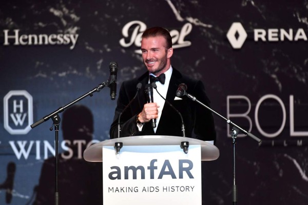 Former England football captain David Beckham talks during the amfAR's 24th Cinema Against AIDS Gala on May 25, 2017 at the Hotel du Cap-Eden-Roc in Cap d'Antibes, France. / AFP PHOTO / ALBERTO PIZZOLI
