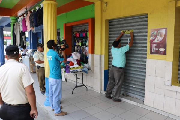 Cierran negocios en Choloma por millonaria morosidad