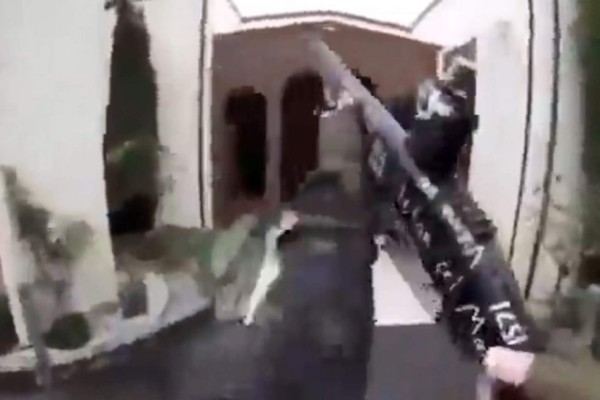 This image grab from a self-shot video that was streamed on Facebook Live on March 15, 2019 by the man who was involved in two mosque shootings in Christchurch shows the man holding a gun as he enters the Masjid al Noor mosque. - A 'right-wing extremist' armed with semi-automatic weapons rampaged through two mosques in the quiet New Zealand city of Christchurch during afternoon prayers on March 15, killing 49 worshippers and wounding dozens more. (Photo by Handout / HANDOUT / AFP) / -----EDITORS NOTE --- RESTRICTED TO EDITORIAL USE - MANDATORY CREDIT 'AFP PHOTO / HANDOUT' - NO MARKETING - NO ADVERTISING CAMPAIGNS - DISTRIBUTED AS A SERVICE TO CLIENTS - NO ARCHIVES