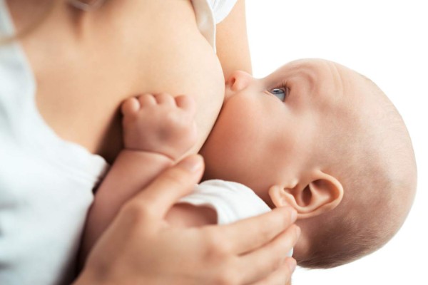 Baby feeds on MOM&#39;s breasts