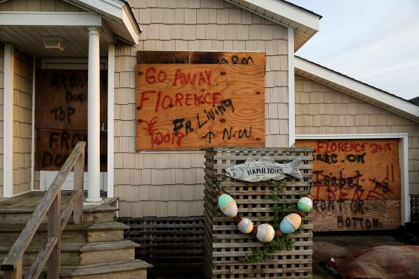 MOREHEAD CITY, NC - SEPTEMBER 12: Windows and doors are boarded up in anticipation of the arrival of Hurricane Florence September 12, 2018 in Morehead City, North Carolina. Coastal cities in North Carolina, South Carolina and Virgnian are under evacuation orders as the category 3 hurricane approaches the United States. Chip Somodevilla/Getty Images/AFP== FOR NEWSPAPERS, INTERNET, TELCOS & TELEVISION USE ONLY ==