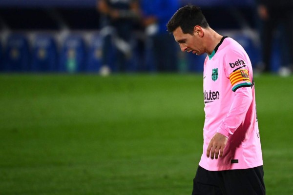 Barcelona's Argentine forward Lionel Messi looks downwards during the Spanish League football match between Getafe and Barcelona at the Coliseum Alfonso Perez stadium in Getafe, south of Madrid, on October 17, 2020. (Photo by GABRIEL BOUYS / AFP)